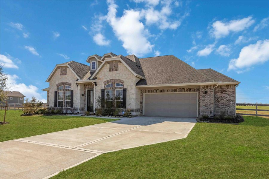 Front exterior of a new home in , Waller, TX, highlighting curb appeal (Image 25).