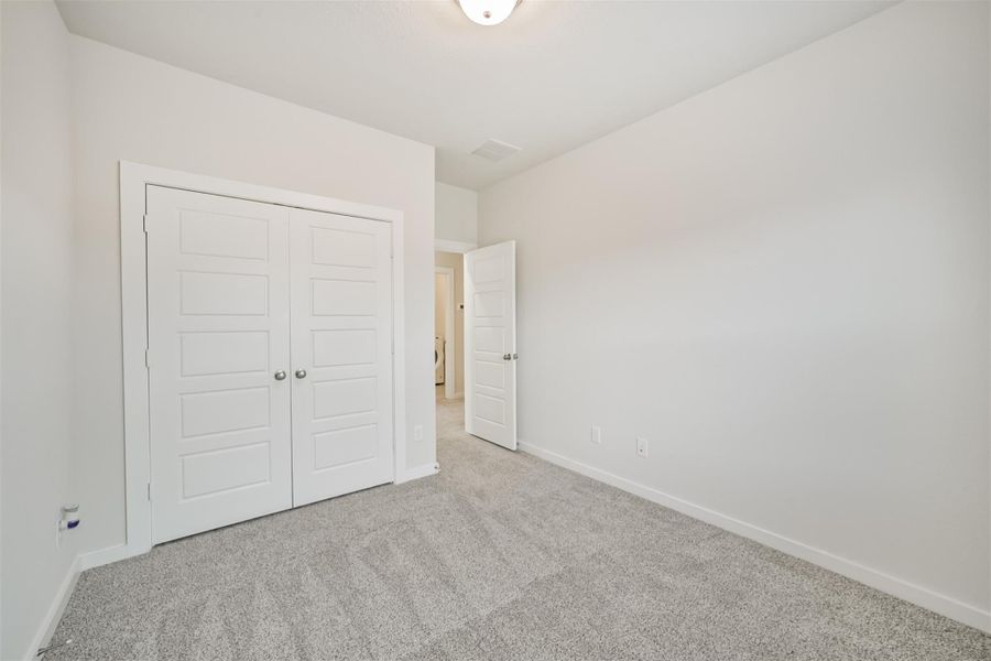 This bedroom has been hardly used and the carpet is effectively brand new. This bedroom has been hardly used and the carpet is effectively brand new.