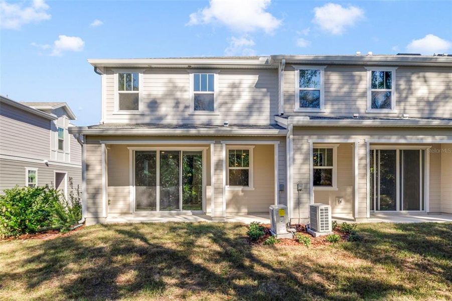 Exterior details and patio area of a home in Towns at Greenleaf, Oviedo (Image 3).