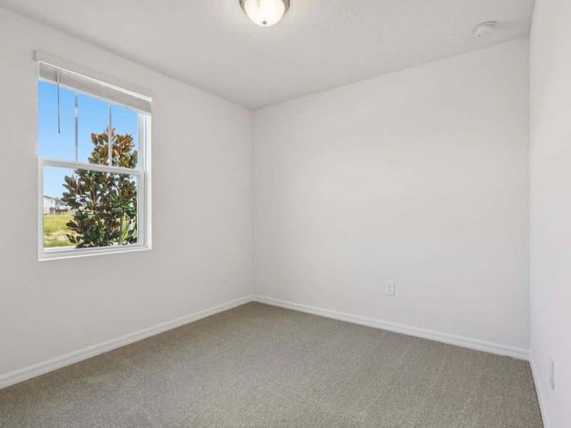 Spacious, unfurnished interior of a new home in Crosswinds - Signature Series, Haines City (Image 9).