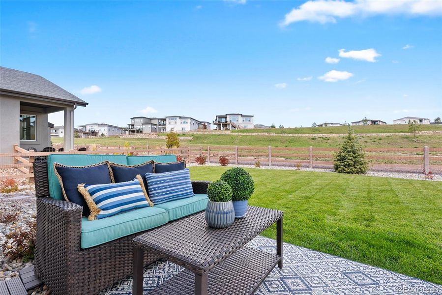Fully fenced backyard with vast views of huge open space & miles of hiking trails.