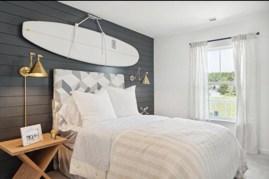 Furnished interior in a model home at Sweetgrass at Summers Corner in Ridgeville (Image 24).