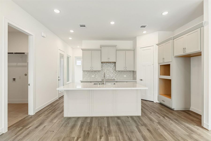 Furnished interior view inside a new home in Bridgeland Central, Cypress (Image 8).