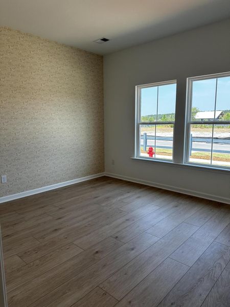 Spacious, unfurnished interior of a new home in Horizons at Carnes Crossroads | 55+: Legends Collection, Summerville (Image 18). Spacious, unfurnished interior of a new home in Horizons at Carnes Crossroads | 55+: Legends Collection, Summerville (Image 18).