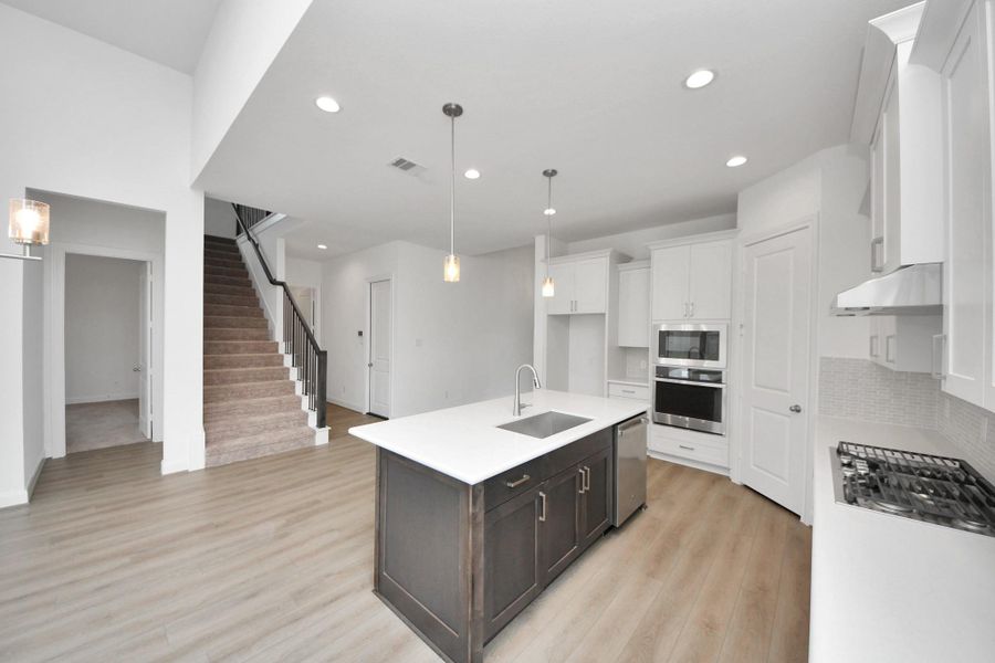 Furnished interior view inside a new home in Marvida, Cypress (Image 6).