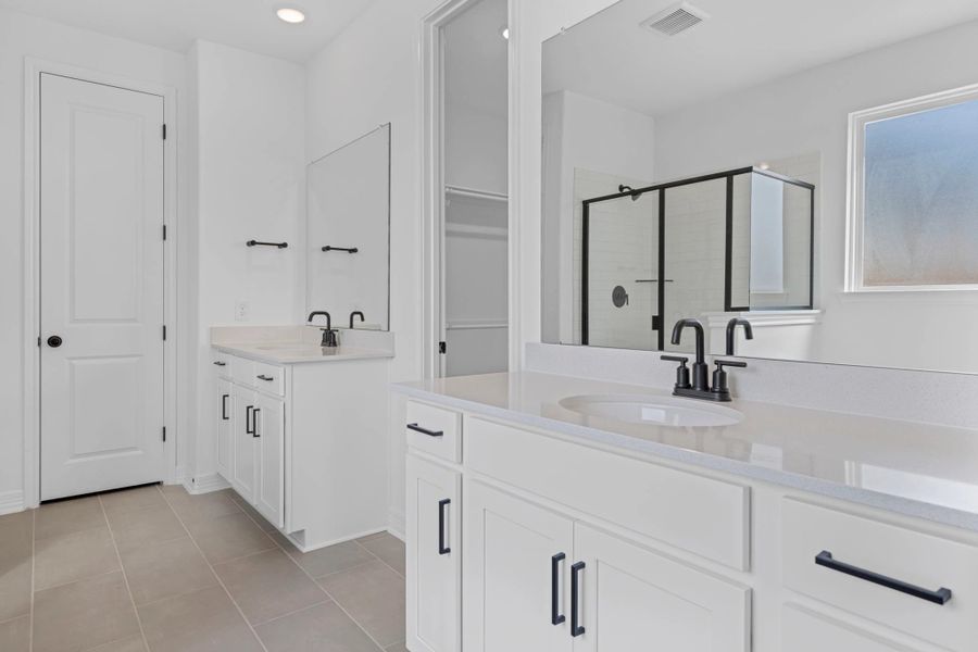 Primary bath. Note: Sample product photo. Actual exterior and interior selections may vary by homesite. Photo may be virtually staged