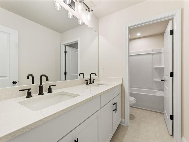 Furnished interior view inside a new home in Melody Lakeside Estates, Buford (Image 9).