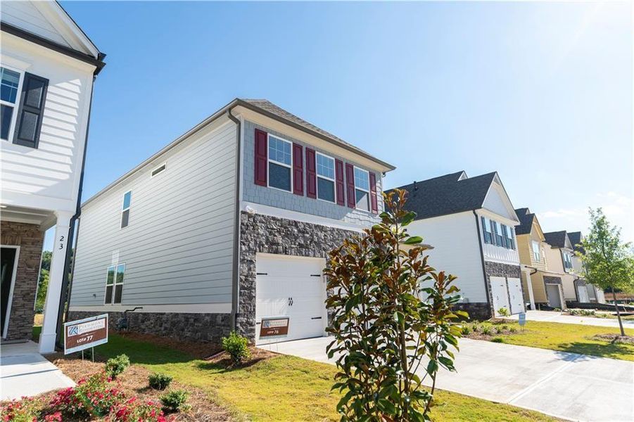 Front exterior of a new home in , Dawsonville, GA, highlighting curb appeal (Image 2).