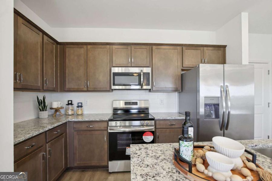 Furnished interior view inside a new home in Crescent Towns, Riverdale (Image 22).