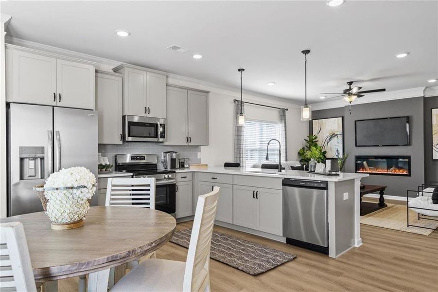 Furnished interior view inside a new home in Trinity Station, Auburn (Image 22).
