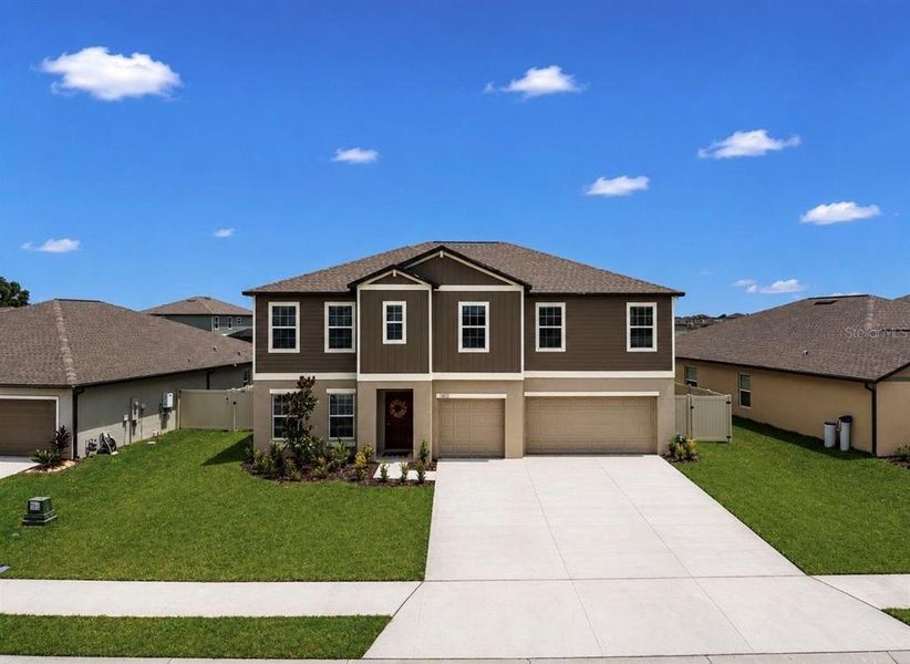 Front exterior of a new home in , Parrish, FL, highlighting curb appeal (Image 2). Front exterior of a new home in , Parrish, FL, highlighting curb appeal (Image 2).