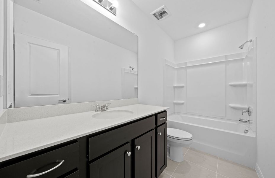 Furnished interior view inside a new home in Whispering Lakes, Lehigh Acres (Image 11). Furnished interior view inside a new home in Whispering Lakes, Lehigh Acres (Image 11).