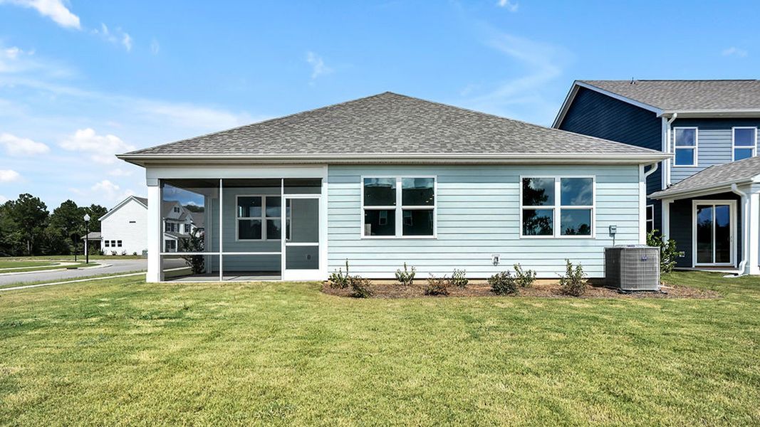 Exterior details and patio area of a home in The Haven at Indigo Preserve, Leland (Image 18).