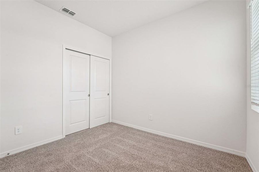 Spacious, unfurnished interior of a new home in The Grove at Stuart Crossing - Premier Series, Bartow (Image 12). Spacious, unfurnished interior of a new home in The Grove at Stuart Crossing - Premier Series, Bartow (Image 12).