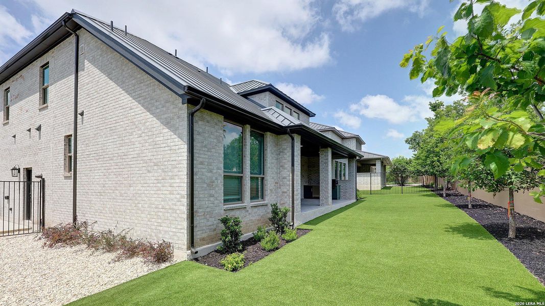 Exterior details and patio area of a home in The Dominion, San Antonio (Image 23).