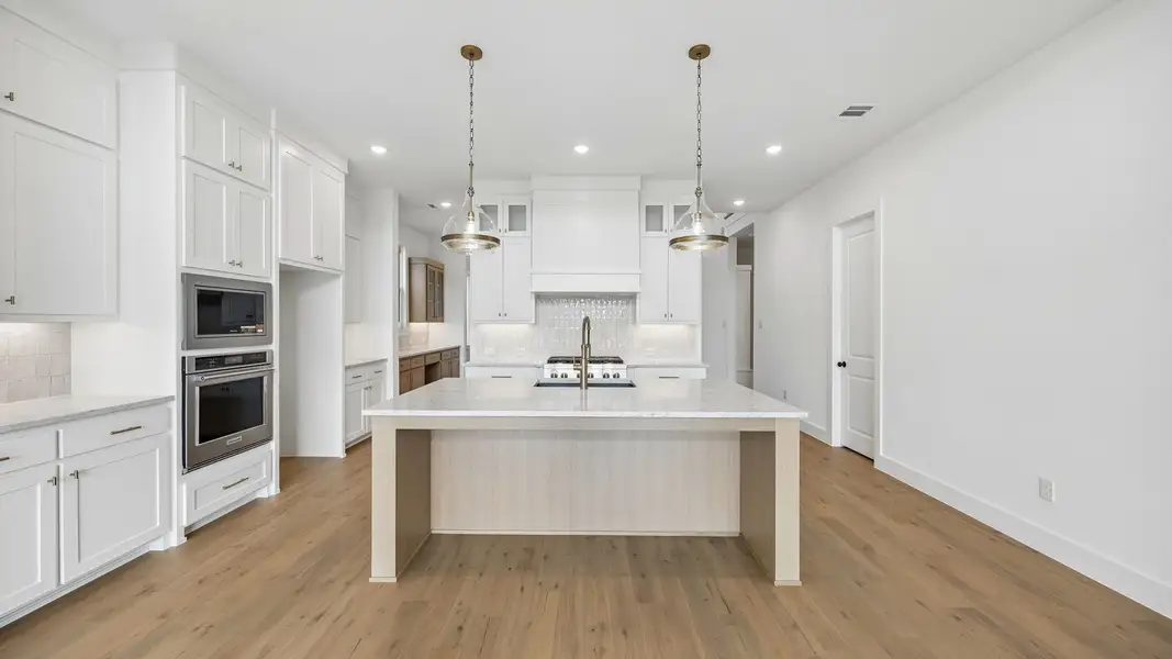 Furnished interior view inside a new home in Painted Tree 50' Series, McKinney (Image 4).