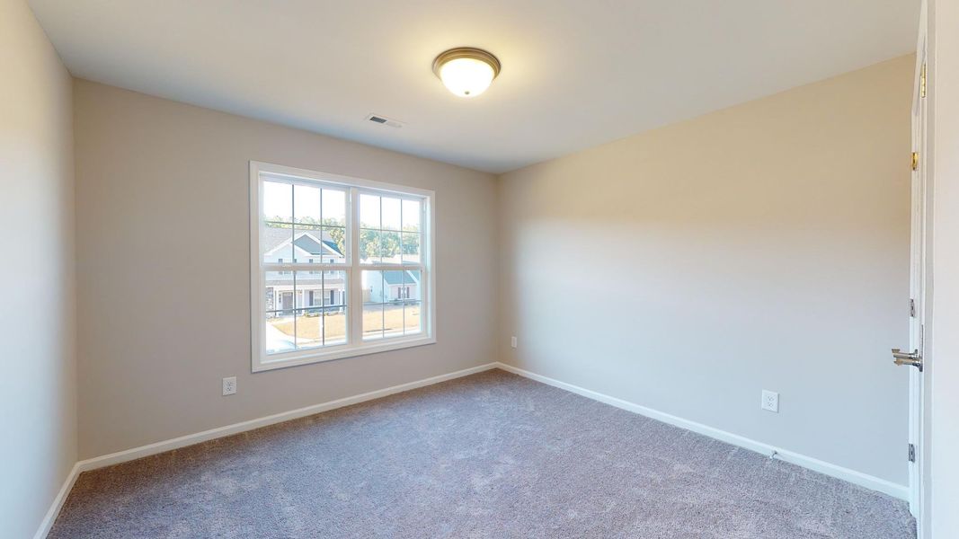 Representative unfurnished interior of a home built from the Westin A by JC Jackson Homes,LLC in Heritage Pointe, Newport (Image 17).