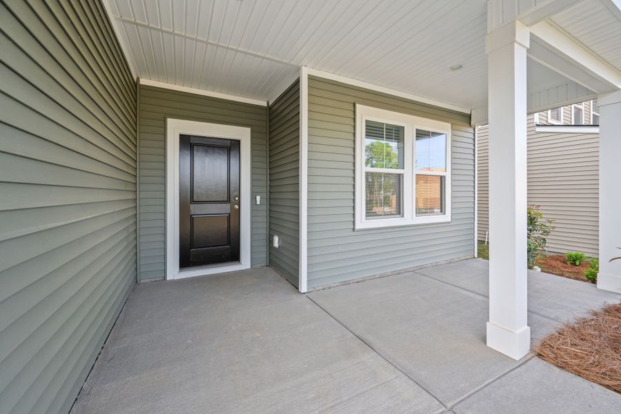 Exterior details and patio area of a home in Grand Arbor, Blythewood (Image 3).