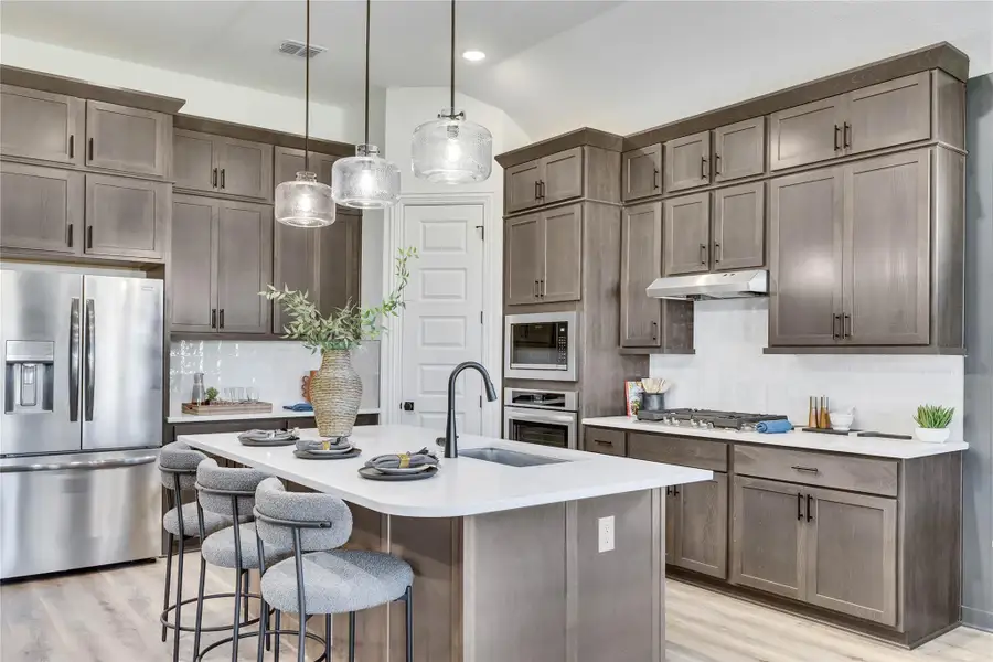 Model home photos of similar floorplans, not pictures of actual home.
