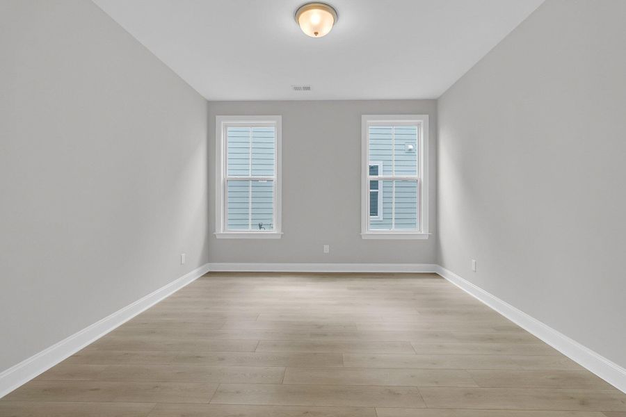 Spacious, unfurnished interior of a new home in Tidewater at Lakes of Cane Bay, Summerville (Image 32). Spacious, unfurnished interior of a new home in Tidewater at Lakes of Cane Bay, Summerville (Image 32).