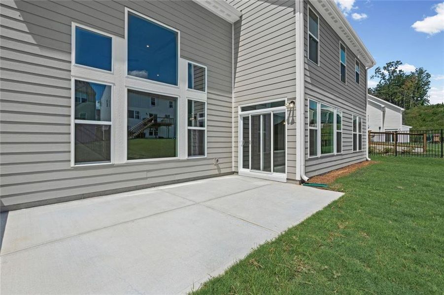 Exterior details and patio area of a home in Twin Lakes, Hoschton (Image 28).