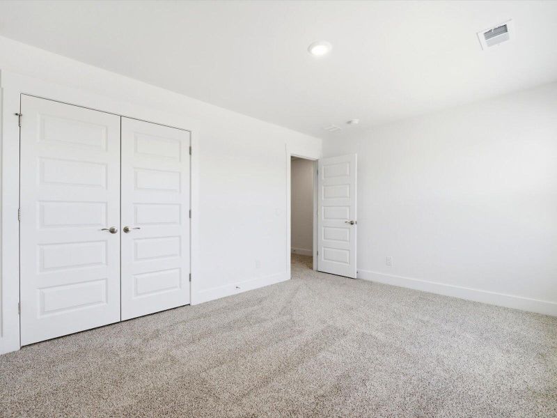 Spacious, unfurnished interior of a new home in The Coves at Lakes of Cane Bay II, Summerville (Image 14). Spacious, unfurnished interior of a new home in The Coves at Lakes of Cane Bay II, Summerville (Image 14).