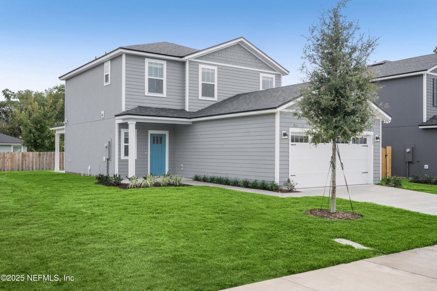 Front exterior of a new home in , Jacksonville, FL, highlighting curb appeal (Image 2). Front exterior of a new home in , Jacksonville, FL, highlighting curb appeal (Image 2).