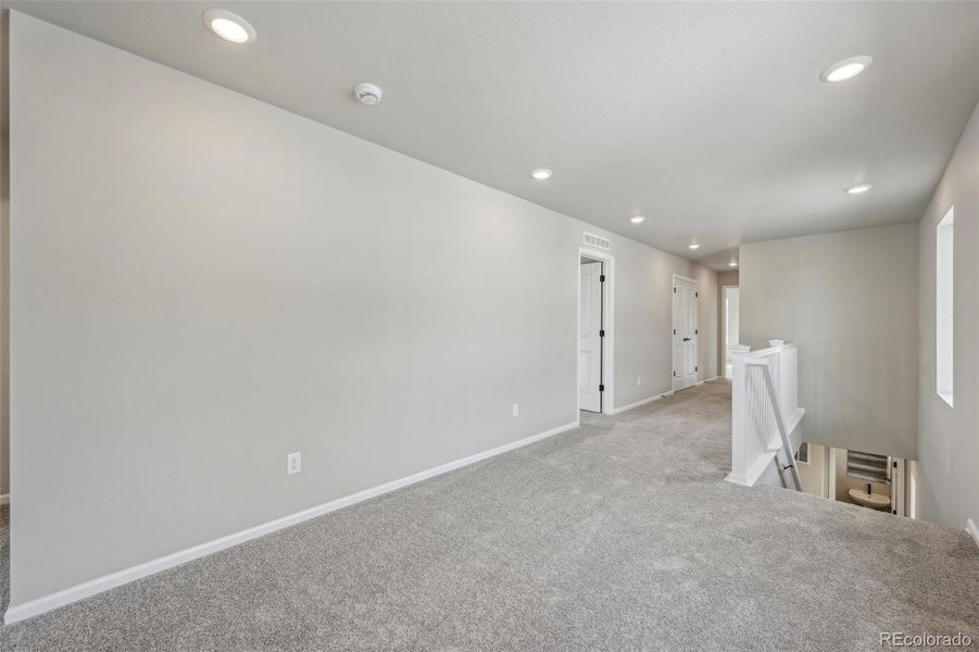 Spacious, unfurnished interior of a new home in The Villas Collection at Sterling Ranch, Littleton (Image 32).