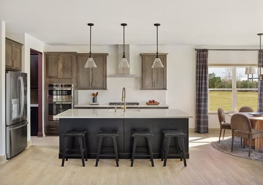 Representative furnished interior of a home built from the Benson by Ashton Woods in The Point, Rolesville (Image 5).