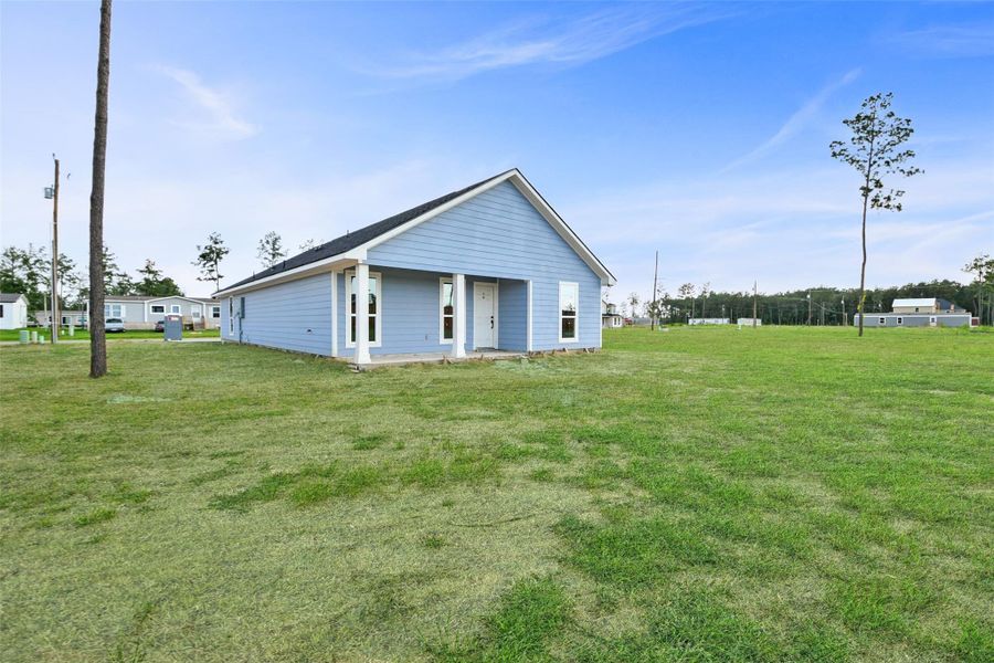 Exterior details and patio area of a home in , Conroe (Image 3). Exterior details and patio area of a home in , Conroe (Image 3).