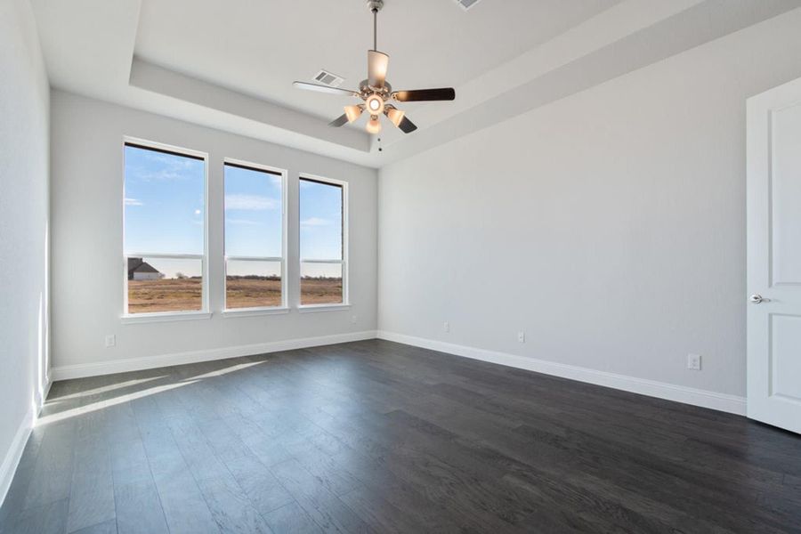 Primary Bedroom | Concept 2406 at The Meadows in Gunter, TX by Landsea Homes