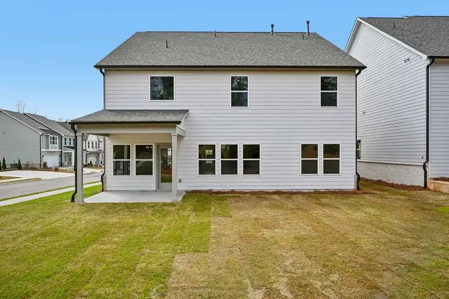 Sample Photo: Rear Exterior with Covered Patio