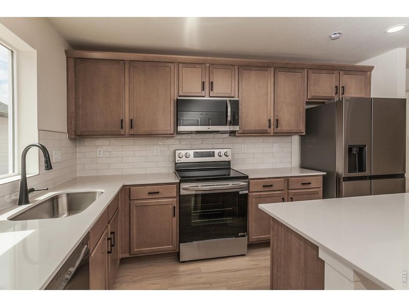 Furnished interior view inside a new home in Prairie Song Story Collection - Single Family Homes, Windsor (Image 11).