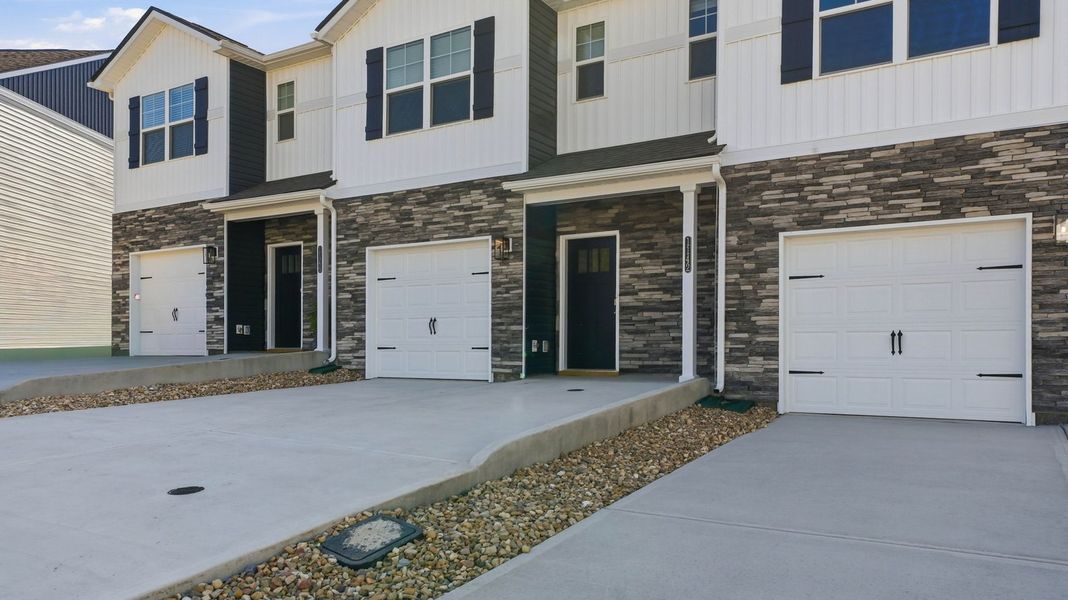 Exterior details and patio area of a home in The Arbor Townhomes, Kingsport (Image 3). Exterior details and patio area of a home in The Arbor Townhomes, Kingsport (Image 3).