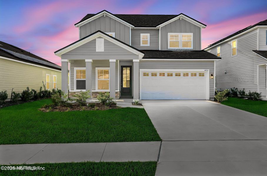 Front exterior of a new home in Hyland Trail, Green Cove Springs, FL, highlighting curb appeal (Image 26).