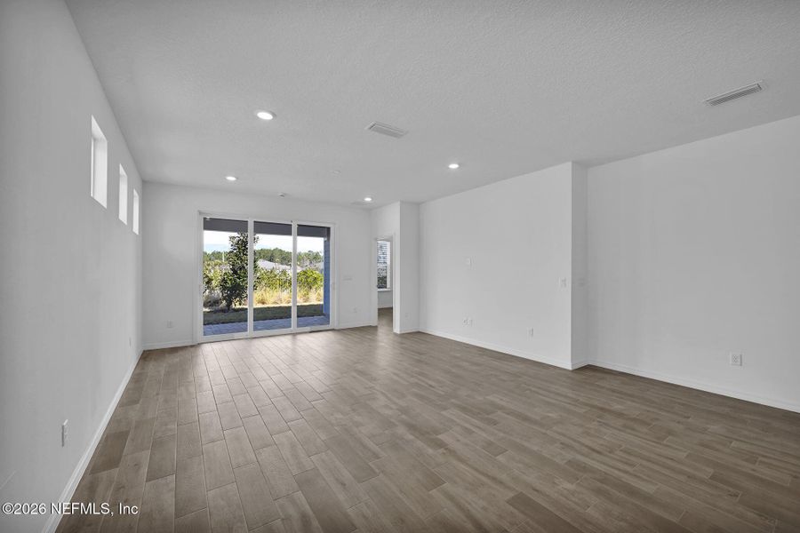 Spacious, unfurnished interior of a new home in Del Webb Wildlight, Yulee (Image 24).