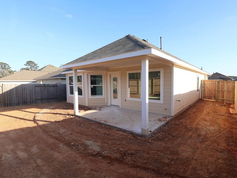 Exterior details and patio area of a home in Magnolia Ridge, Magnolia (Image 4).