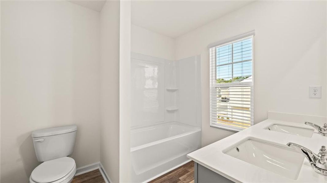 Furnished interior view inside a new home in Inverness at Sugarloaf, Lawrenceville (Image 13).