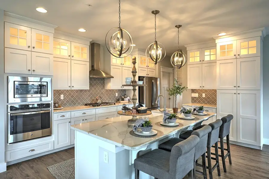 Representative furnished interior of a home built from the Augusta by Keystone Custom Homes in McLean South Shore, Belmont (Image 6).