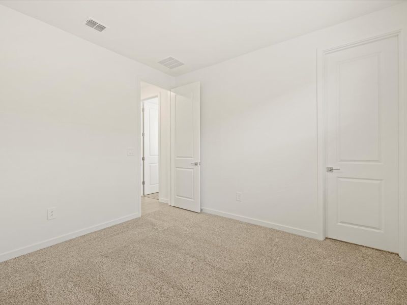 Spacious, unfurnished interior of a new home in Rancho Mirage Signature Series, Maricopa (Image 15).