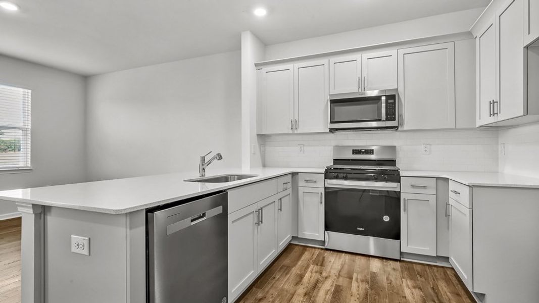 Furnished interior view inside a new home in Clock Road Townhomes, New Bern (Image 4).