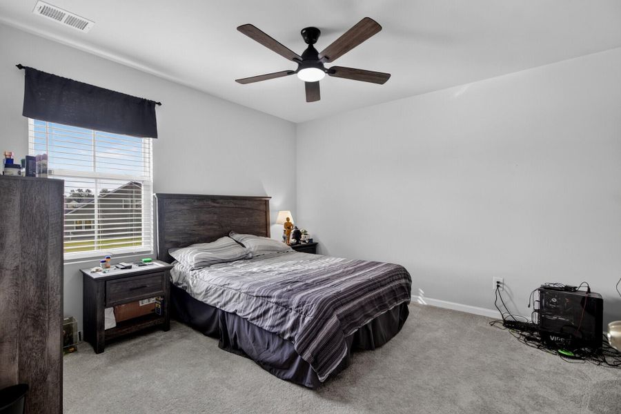 Furnished interior view inside a new home in Lindera Preserve at Cane Bay Plantation, Summerville (Image 26).
