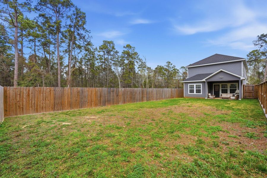 Exterior details and patio area of a home in , Conroe (Image 22).