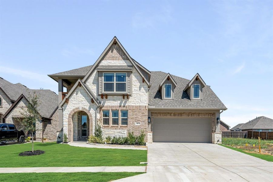 Front exterior of a new home in Eagle Glen 50, Alvarado, TX, highlighting curb appeal (Image 2).