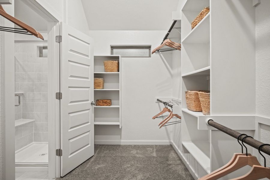Primary Closet in the Diamond home plan by Trophy Signature Homes – REPRESENTATIVE PHOTO