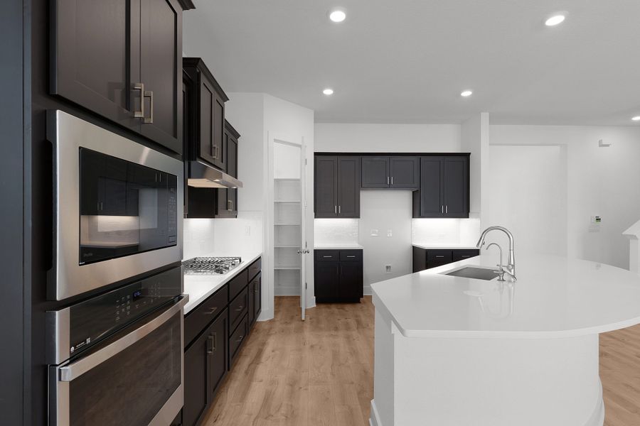 Furnished interior view inside a new home in Lariat, Liberty Hill (Image 6). Furnished interior view inside a new home in Lariat, Liberty Hill (Image 6).