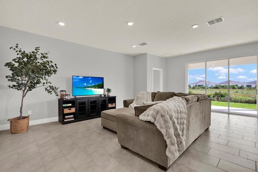 Furnished interior view inside a new home in Woodcreek, Wesley Chapel (Image 9).