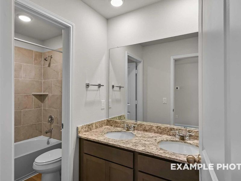 Furnished interior view inside a new home in Caney Creek Place, Conroe (Image 13).