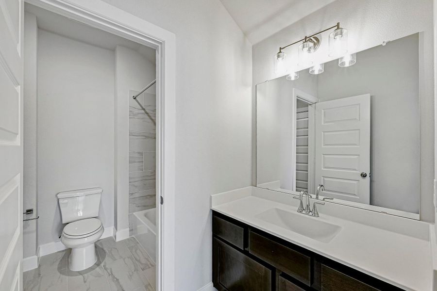 Furnished interior view inside a new home in Santa Rita Ranch - 60', Liberty Hill (Image 8). Furnished interior view inside a new home in Santa Rita Ranch - 60', Liberty Hill (Image 8).