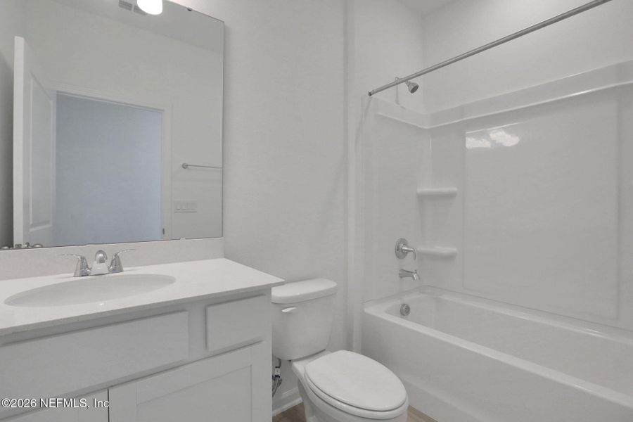 Furnished interior view inside a new home in Amberly, Green Cove Springs (Image 7).